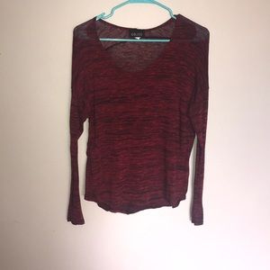 Long sleeve red shirt.